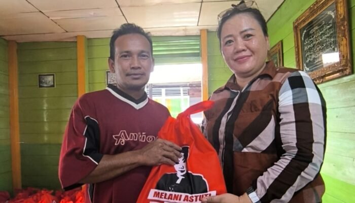 Sekretaris Komisi II DPRD, Melani Astuti Bantu Korban Banjir di Desa Beringin Kecamatan Sajad