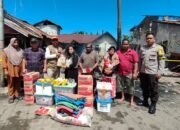 BPBD Kabupaten Mempawah saat menyerahkan bantuan logistik kepada korban kebakaran di Gang Nelayan Sungai Pinyuh.