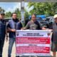 Anggota Polres Mempawah beri imbauan ke pengantre BBM di SPBU.